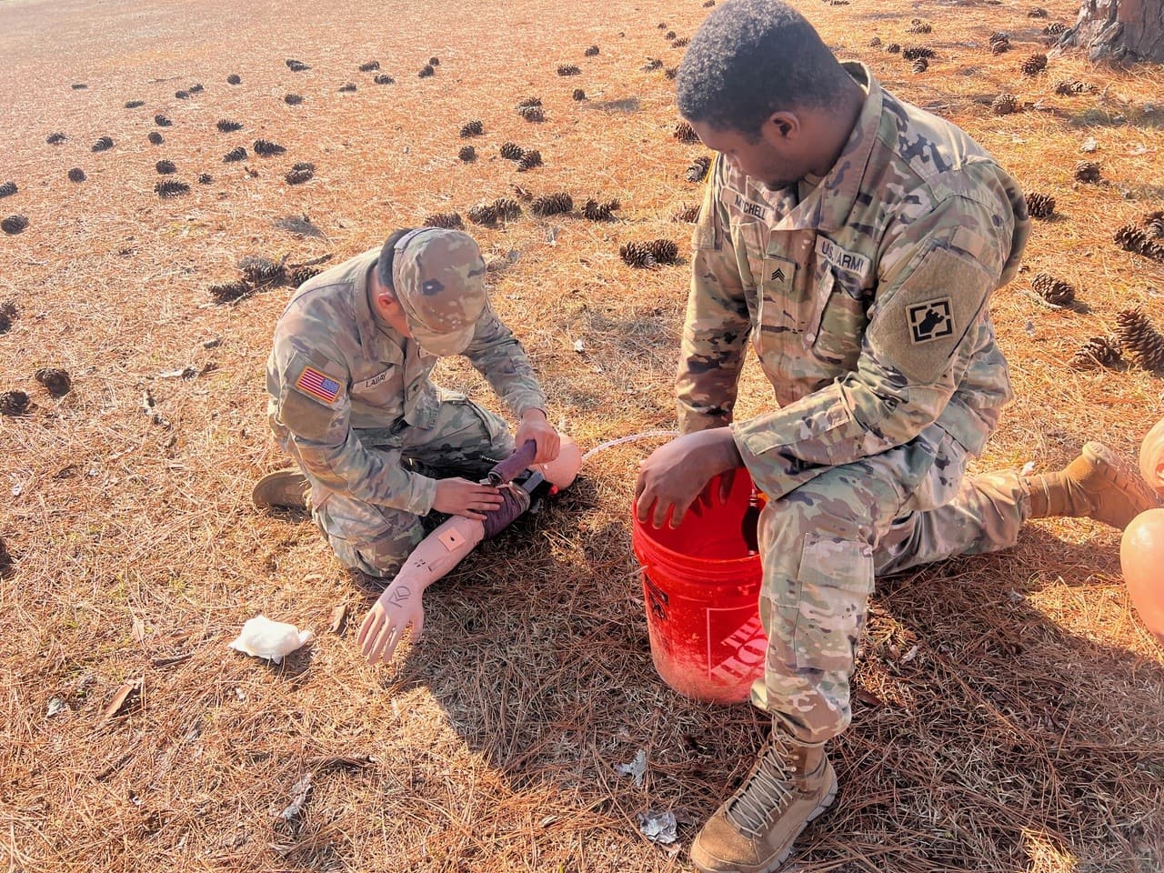 Soldiers training with the RDMT arm trainer